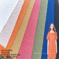Precio barato de fábrica textiles al por mayor jacquard prendas compuesto rayon nylon mezcla tela de jersey viscosa tejida para ropa para ropa
